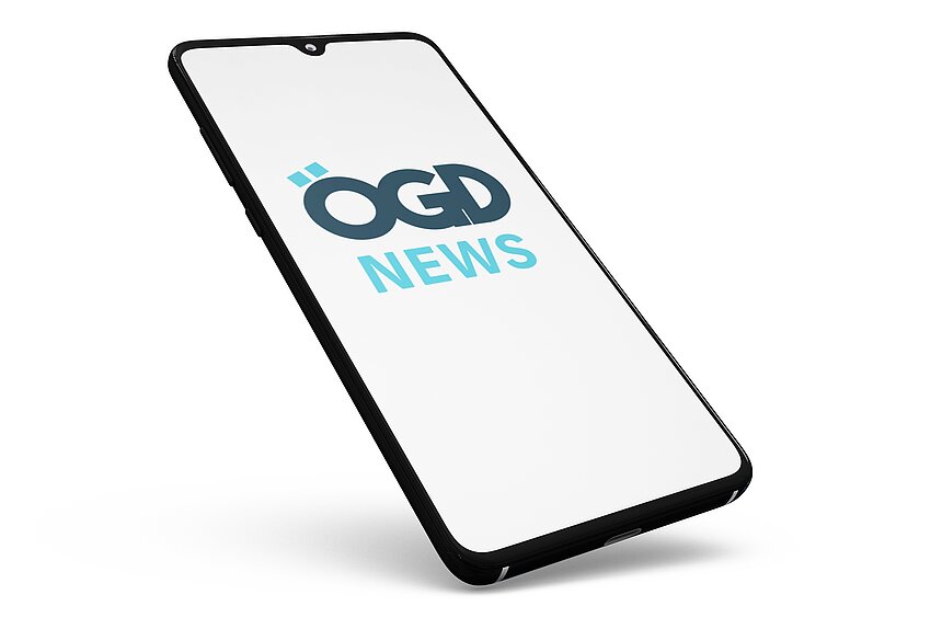 Das Bild zeigt ein Handy mit dem Startbildschirm der App „ÖGD NEWS“